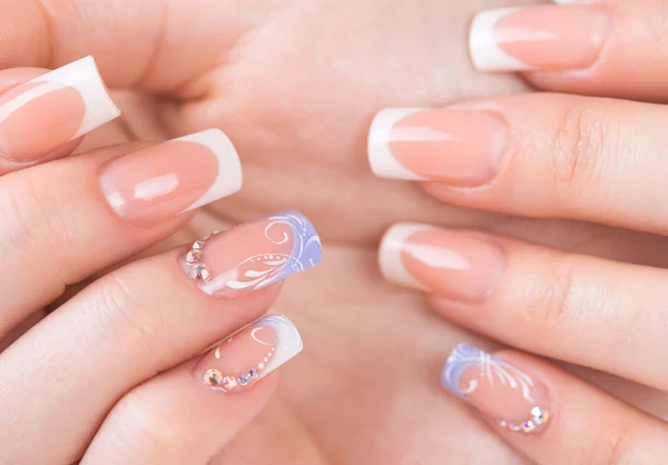 Beautiful female hands with french manicure — Stock Photo, Image
