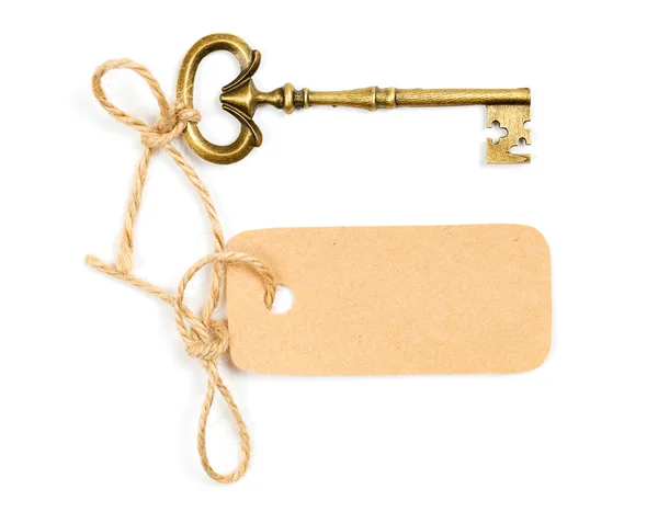 Vintage key with a tag for the text — Stock Photo, Image