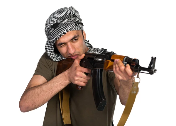 Terrorist with automatic gun on white background — Stock Photo, Image