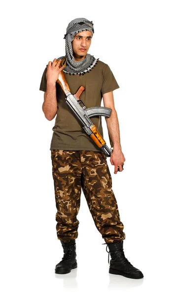 Terrorist met automatische geweer op witte achtergrond — Stockfoto