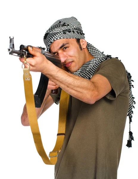 Terrorist with automatic gun on white background — Stock Photo, Image