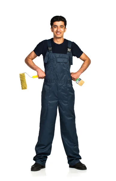 Repairman Arab nationality in the construction overalls on a whi — Stock Photo, Image