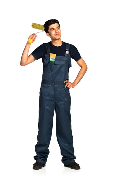 Repairman Arab nationality in the construction overalls on a whi — Stock Photo, Image