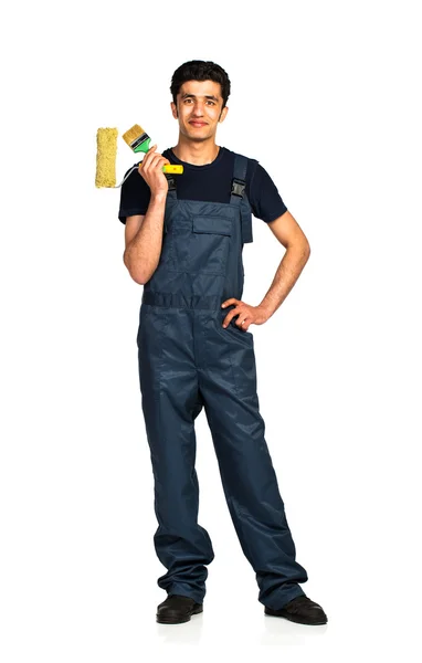 Repairman Arab nationality in the construction overalls on a whi — Stock Photo, Image