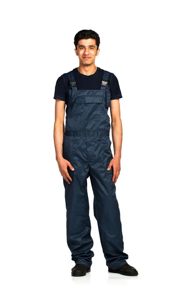 Repairman Arab nationality in the construction overalls on a whi — Stock Photo, Image