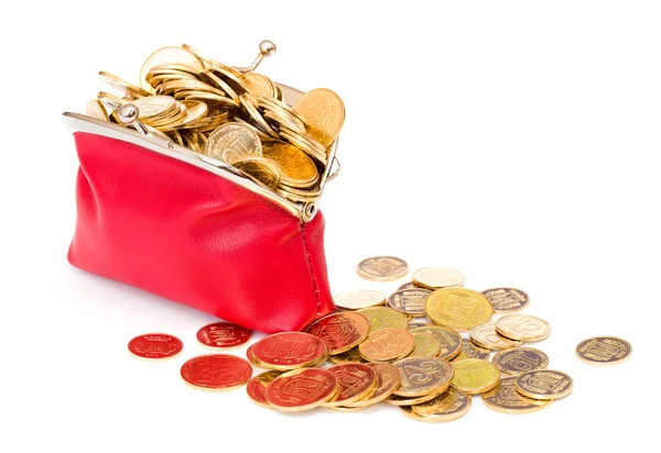 Red purse full of gold coins on a white — Stock Photo, Image