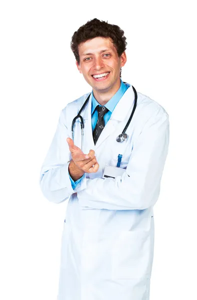Retrato de um médico masculino sorridente mostrando o dedo para você — Fotografia de Stock