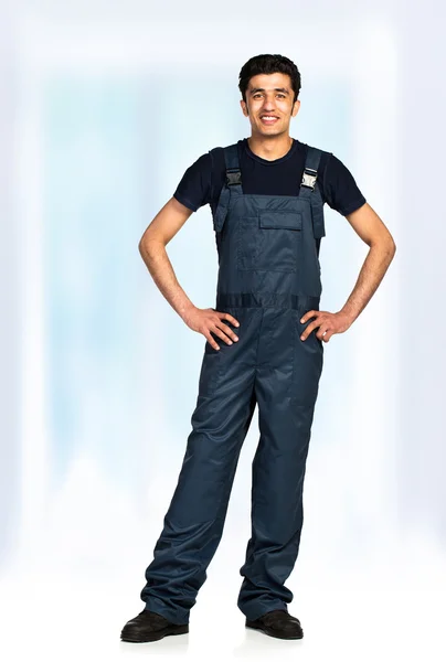 Repairman in the construction overalls — Stock Photo, Image