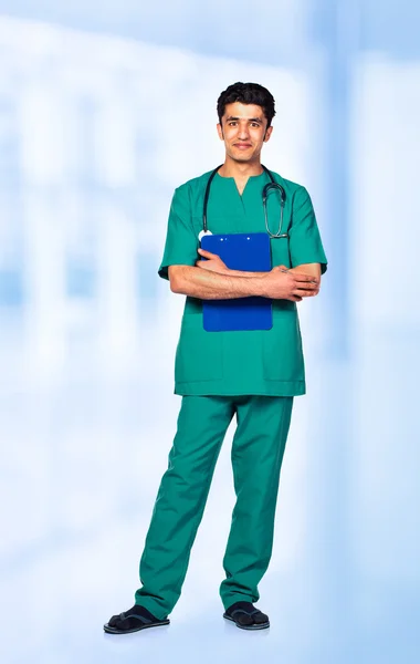 Portrait of the smiling arab doctor on interior — Stock Photo, Image