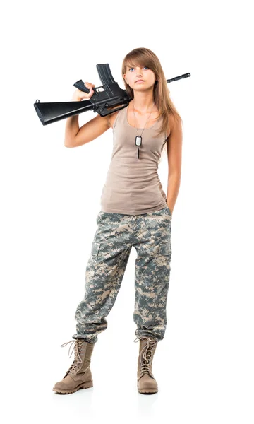 Soldier young beautyful girl dressed in a camouflage with a gun — Stock Photo, Image