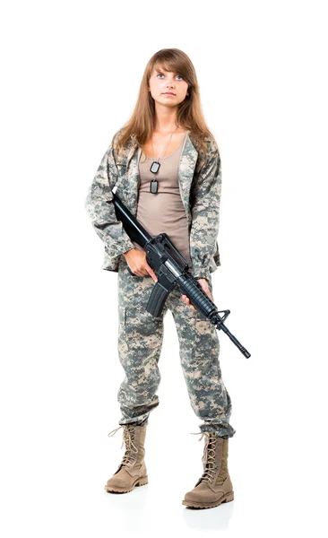 Soldier young beautyful girl dressed in a camouflage with a gun — Stock Photo, Image