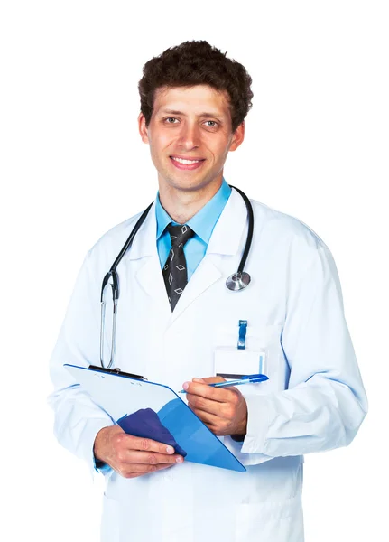 Portrait of smiling young male doctor writing on a patient's me Stock Picture