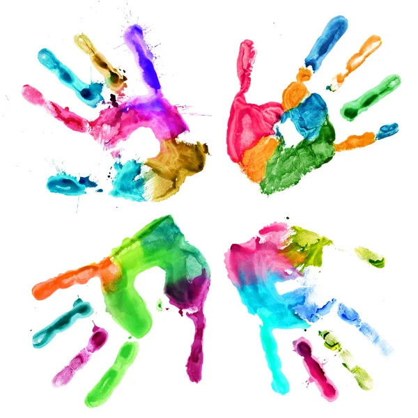 Huellas de manos en diferentes colores sobre un blanco — Foto de Stock