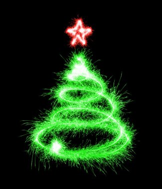 Noel ağacı üzerinde siyah bir maytap tarafından yapılan