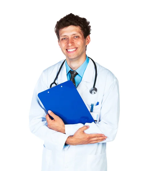 Portrait of smiling young male doctor writing on a patient's med — Stock Photo, Image