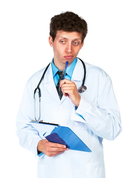Portrait of deliberating young male doctor writing on a patient' Stock Image
