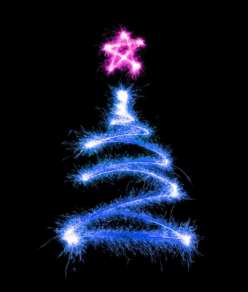 Árbol de Navidad hecho por luces de Bengala en un negro — Zdjęcie stockowe