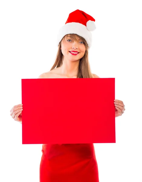 与白色衬底上的红色标语牌的圣诞小女孩微笑着 — 图库照片