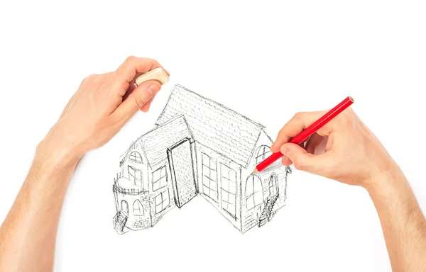 Hands drawing big house on a white — Stock Photo, Image