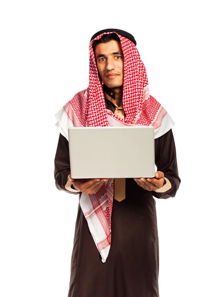 Young arab with laptop isolated on white background — Stock Photo, Image