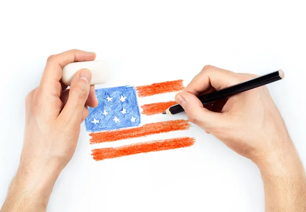 Adamın elleri kalem ile berabere ABD bayrağı üzerine beyaz — Stok fotoğraf