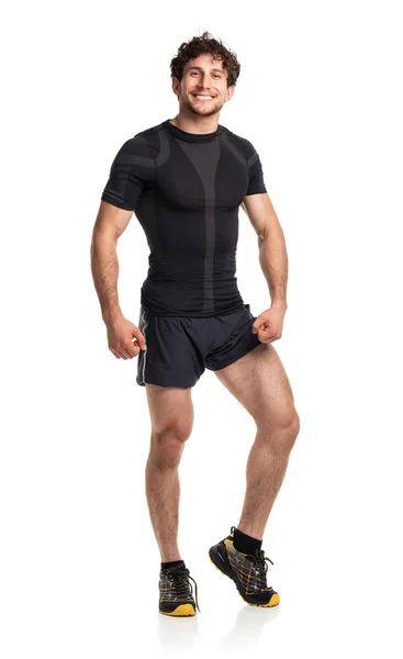 Athletic attractive man after fitness exersise on the white — Stock Photo, Image