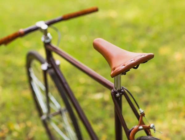 Stylish bicycle on grass — Stock Photo, Image