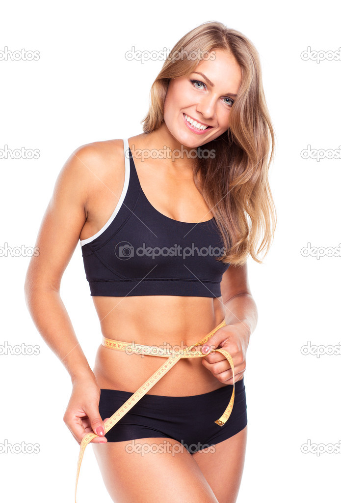 Portrait of attractive caucasian smiling woman with measuring ta