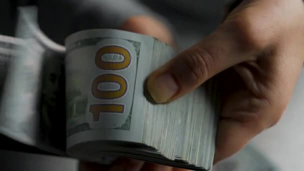 Hands counting US Dollar bills or paying in cash against the backdrop of police car lights — Stock Video