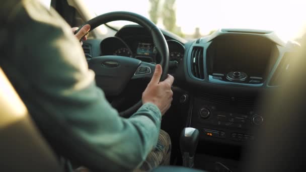 Man Drives Car Road Setting Sun Shines Windshield View Drivers — Stock Video