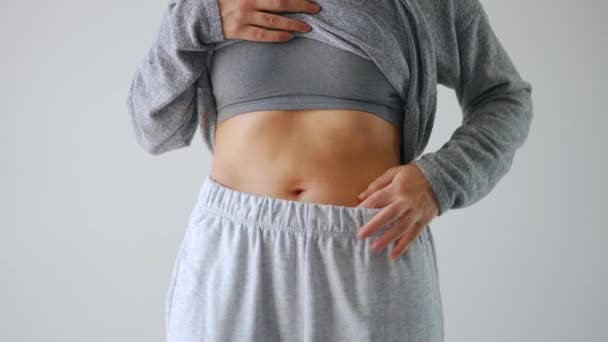 Woman Squeezes Skin Her Stomach Sides Checking Excess Subcutaneous Fat — Vídeos de Stock