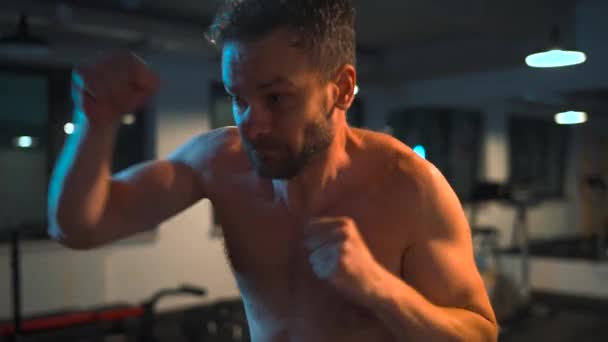 Alone Male Boxer Working Out Blows Punching Bag Gym Evening — Video Stock