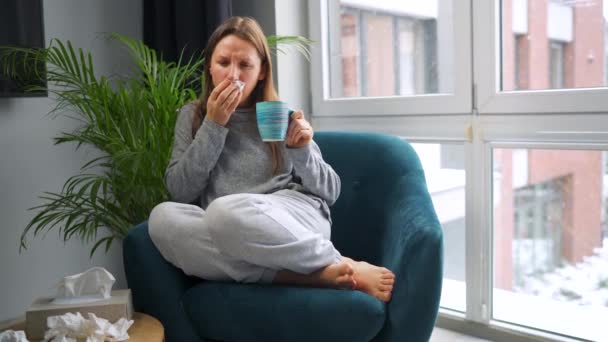 Unhealthy Caucasian Woman Sits Chair Drinks Hot Tea Cold Medicine — Stockvideo