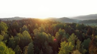 Aerial view of a summer mountain landscape at sunset with rocky peaks on the background. Tatra Mountains, Poland