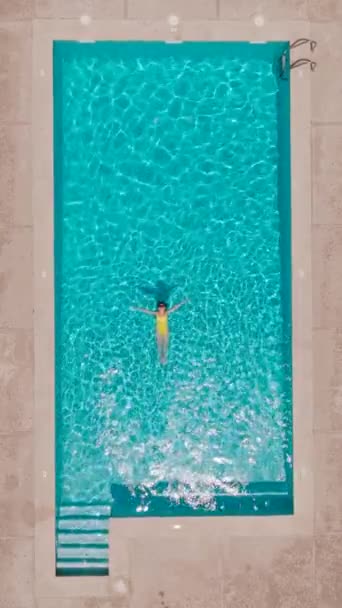 Vertical Video Top View Woman Yellow Swimsuit Lying Her Back — Stock Video