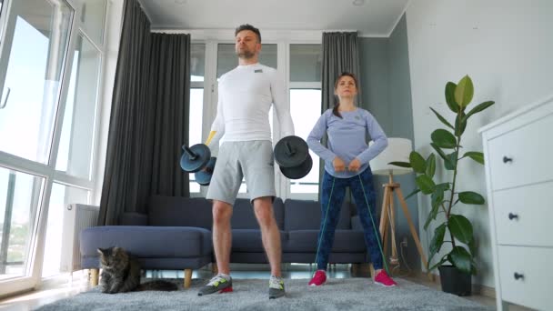 Caucasian Couple Doing Strength Training Home Cozy Bright Room Slow — Vídeo de Stock