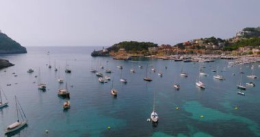 Majorca, Spain. Aerial view of summer resort town Port de Soller on Mallorca Majorca island, sandy beach, boats, yachts, clear waters of Mediterranean Sea - landscape of Balearic Islands from above