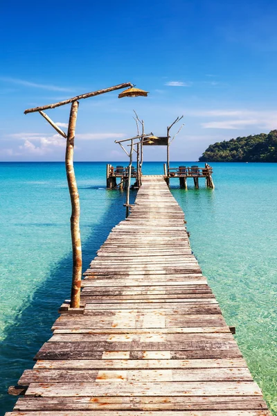 Old wooden pier in the sea — Stock Photo, Image