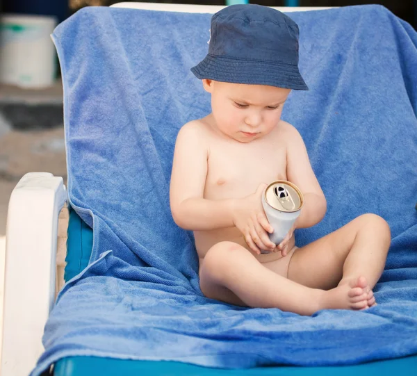 Small boy on beach chair — Stock Photo, Image
