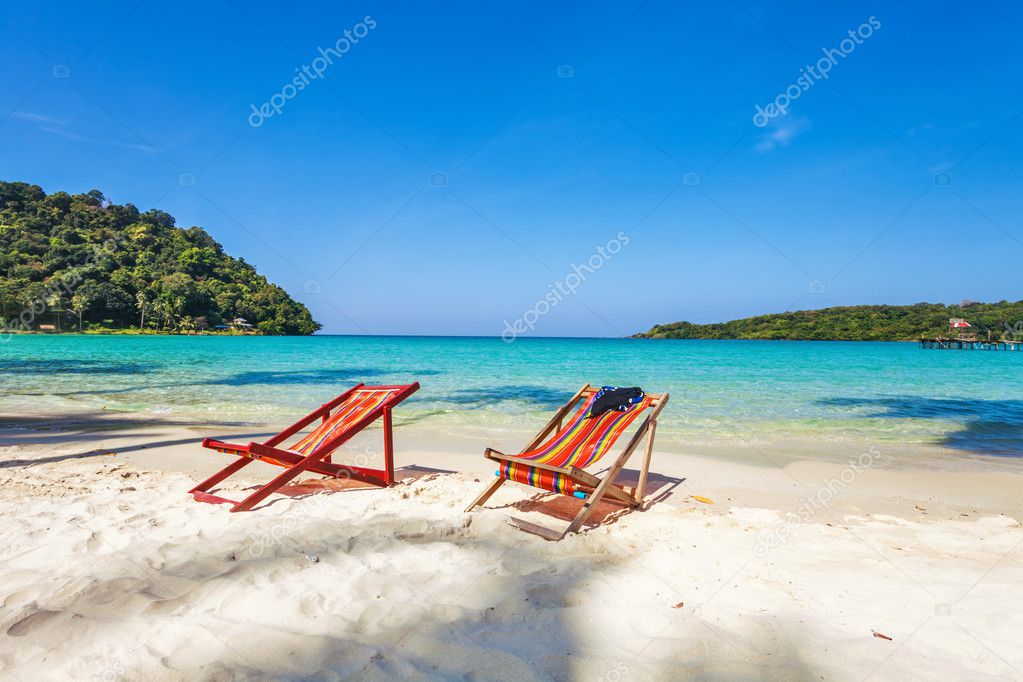 sun beach chairs at the beach