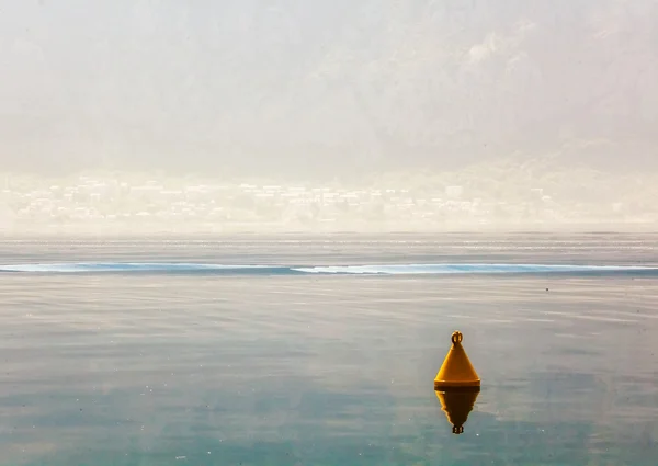 The yellow buoy in the sea — Stock Photo, Image