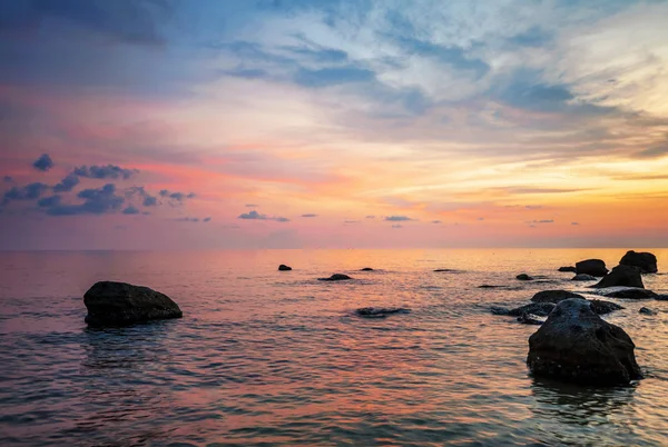 Praia ao pôr do sol — Fotografia de Stock