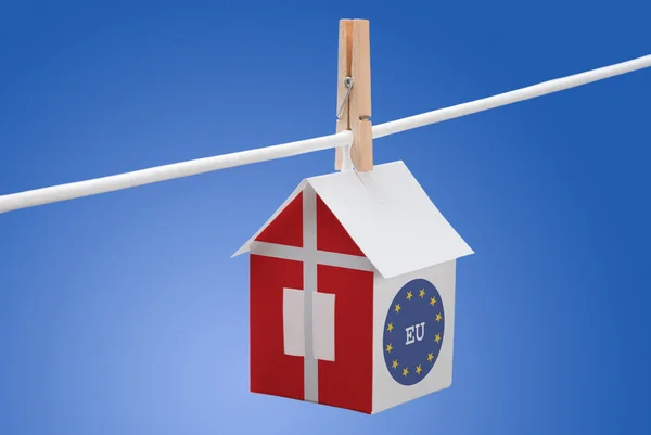 Denmark and EU flag on paper house — Stock Photo, Image