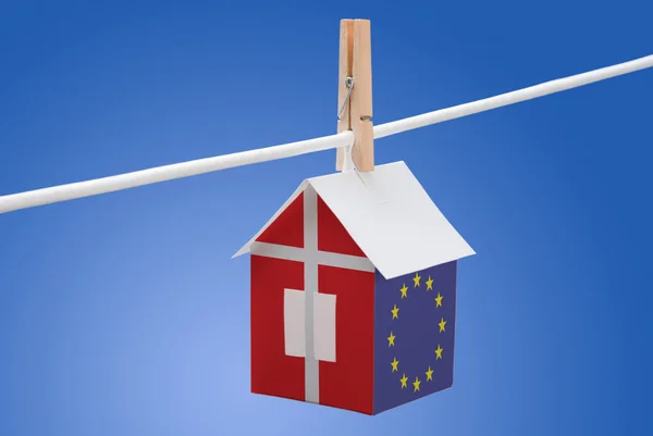 Denmark and EU flag on paper house — Stock Photo, Image