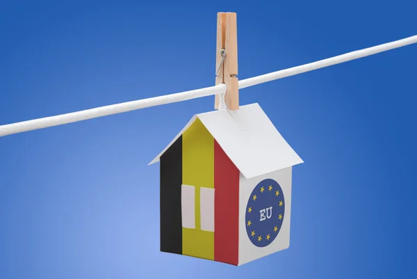 Belgian end EU flag on paper house — Stock Photo, Image