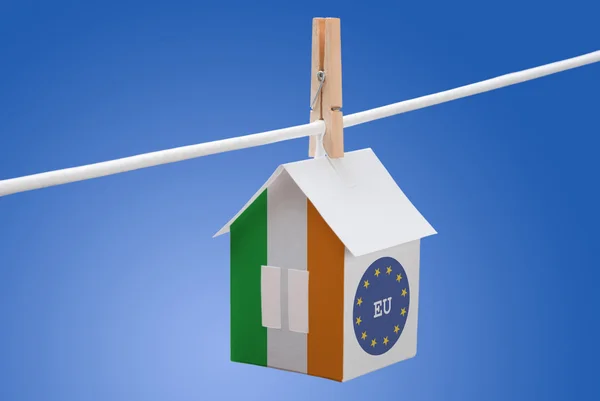 Ireland and EU flag on paper house — Stock Photo, Image