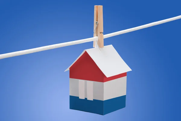 Netherlands, dutch flag on paper house — Stock Photo, Image