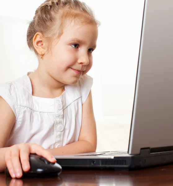 Child with laptop Stock Image