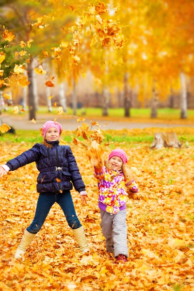 Happy children in autumn park — Stock Photo, Image