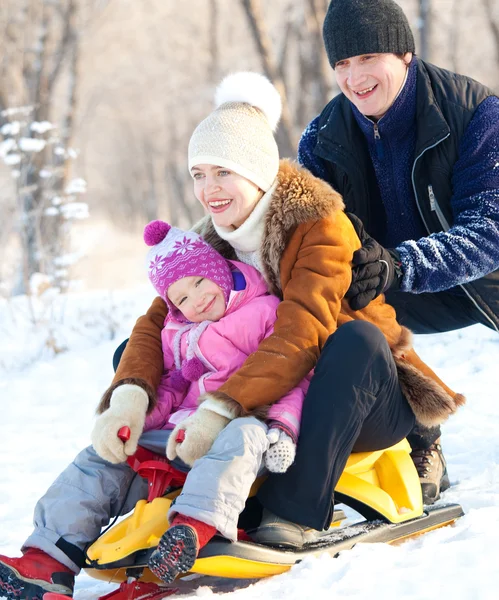 Family sledding — Stock Photo, Image